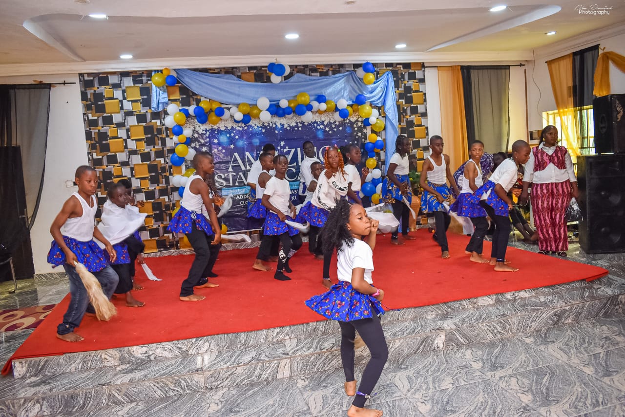 Cultural dance in colourful ankara skirts